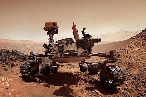 ゲール・クレータにかつて存在した水環境を調査するNASAの火星探査車「キュリオシティ」の想像図（NASA提供）